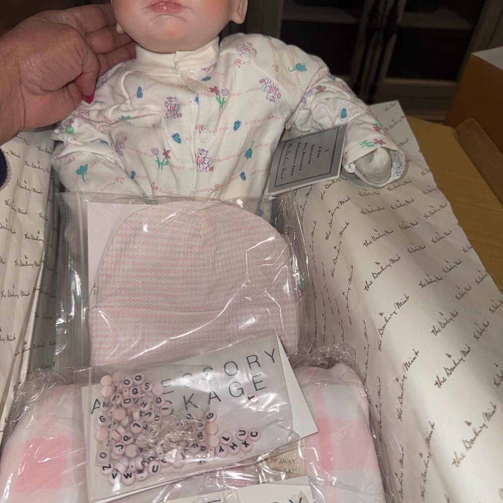 Adorable Baby Doll with Pink Outfit